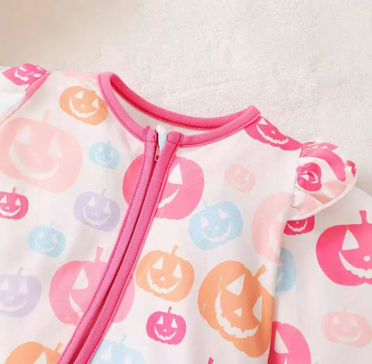 Jack-O’-Lantern Ruffle Onesie